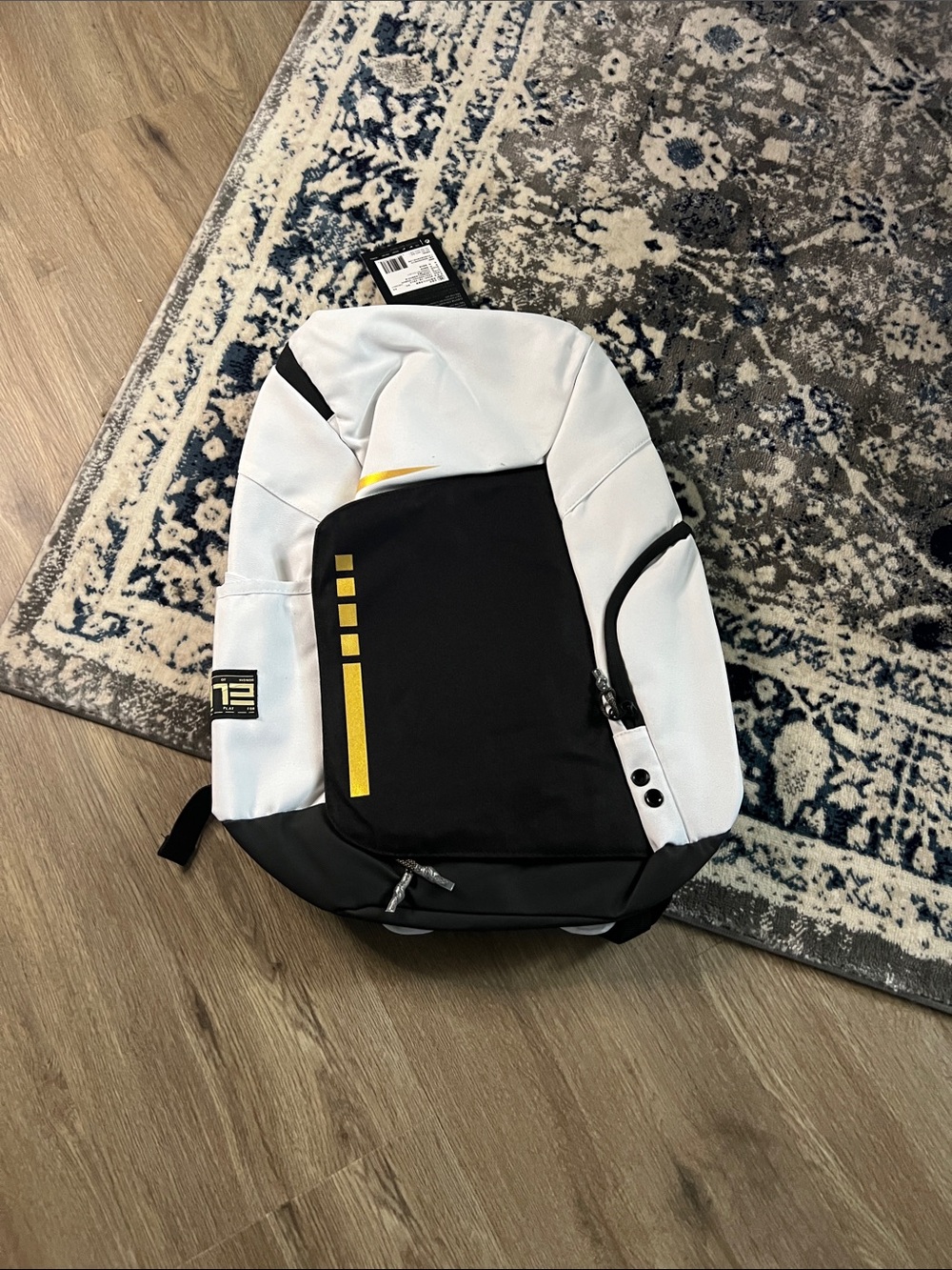 Nike White and Black Men's Backpack with Yellow Accent